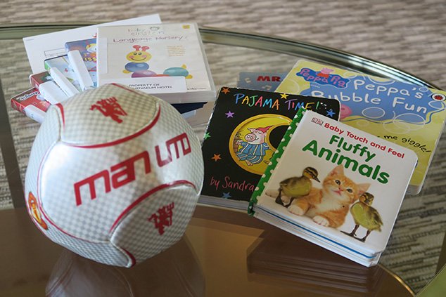 Atheneum concierge organised age appropriate toys in room