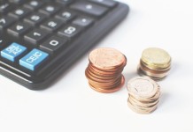 Family vacations on a budget - Coins and calculator