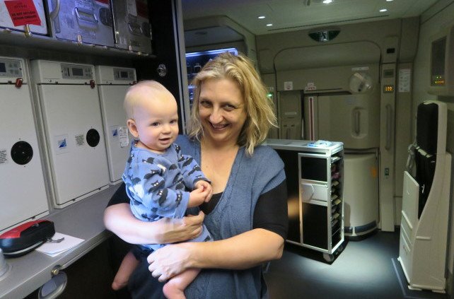 Baby befriending strangers on train